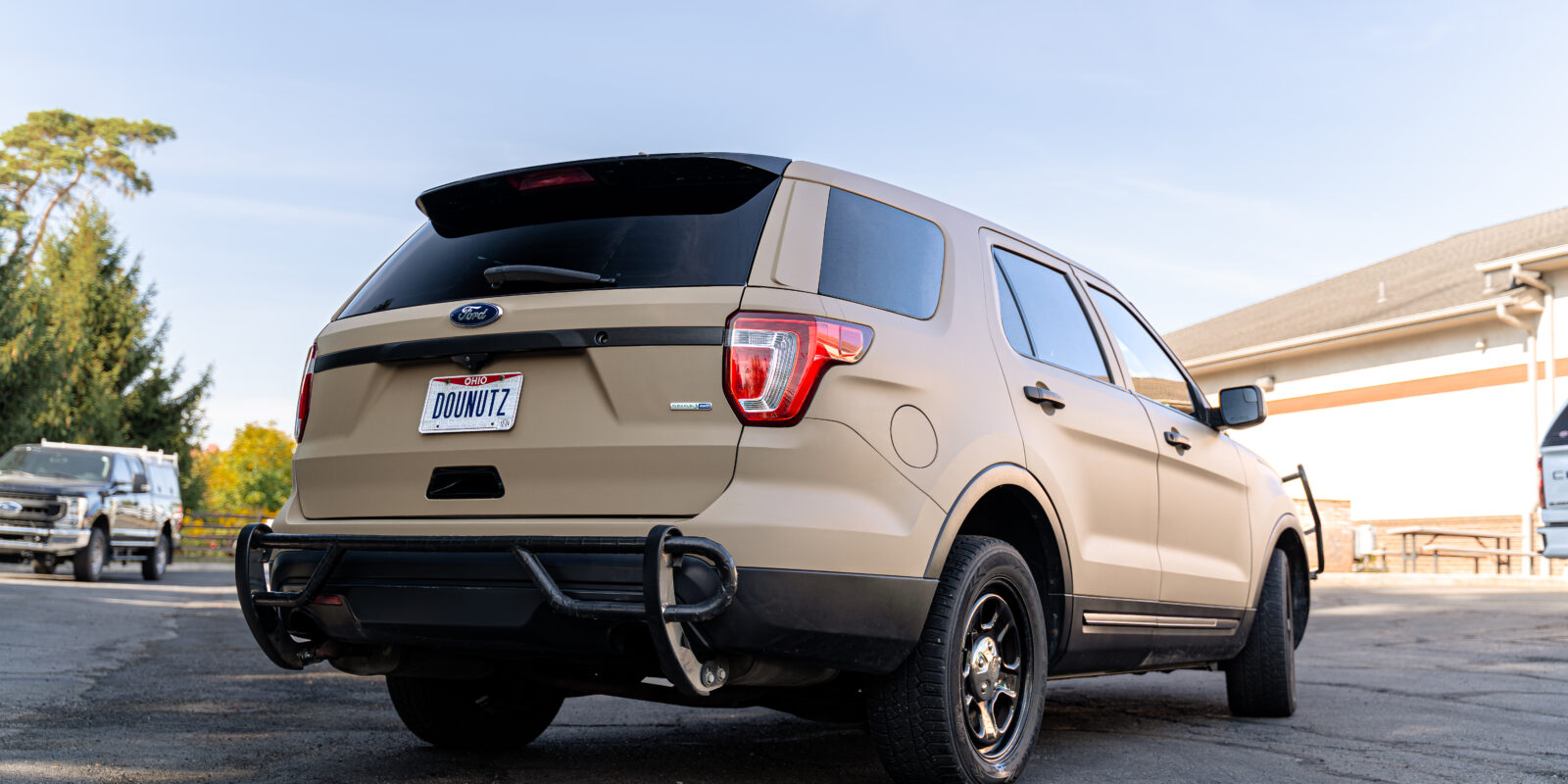 Ford Explorer Cruiser with matte sand vinyl wrap