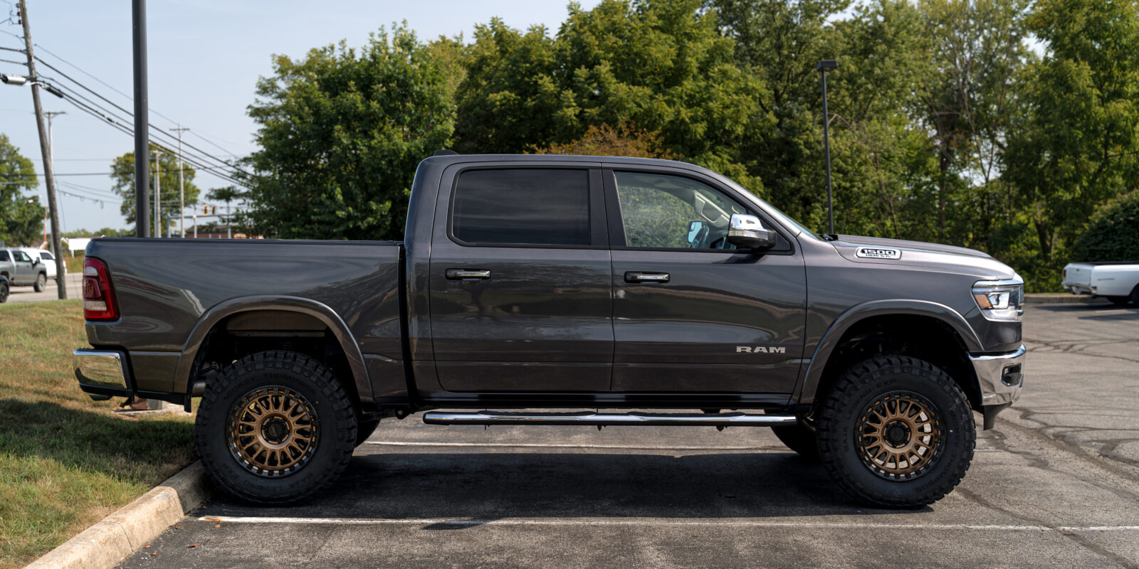 5th Gen ram with Readylift lift kit, KMC Wheels, and Mickey Thompson tires