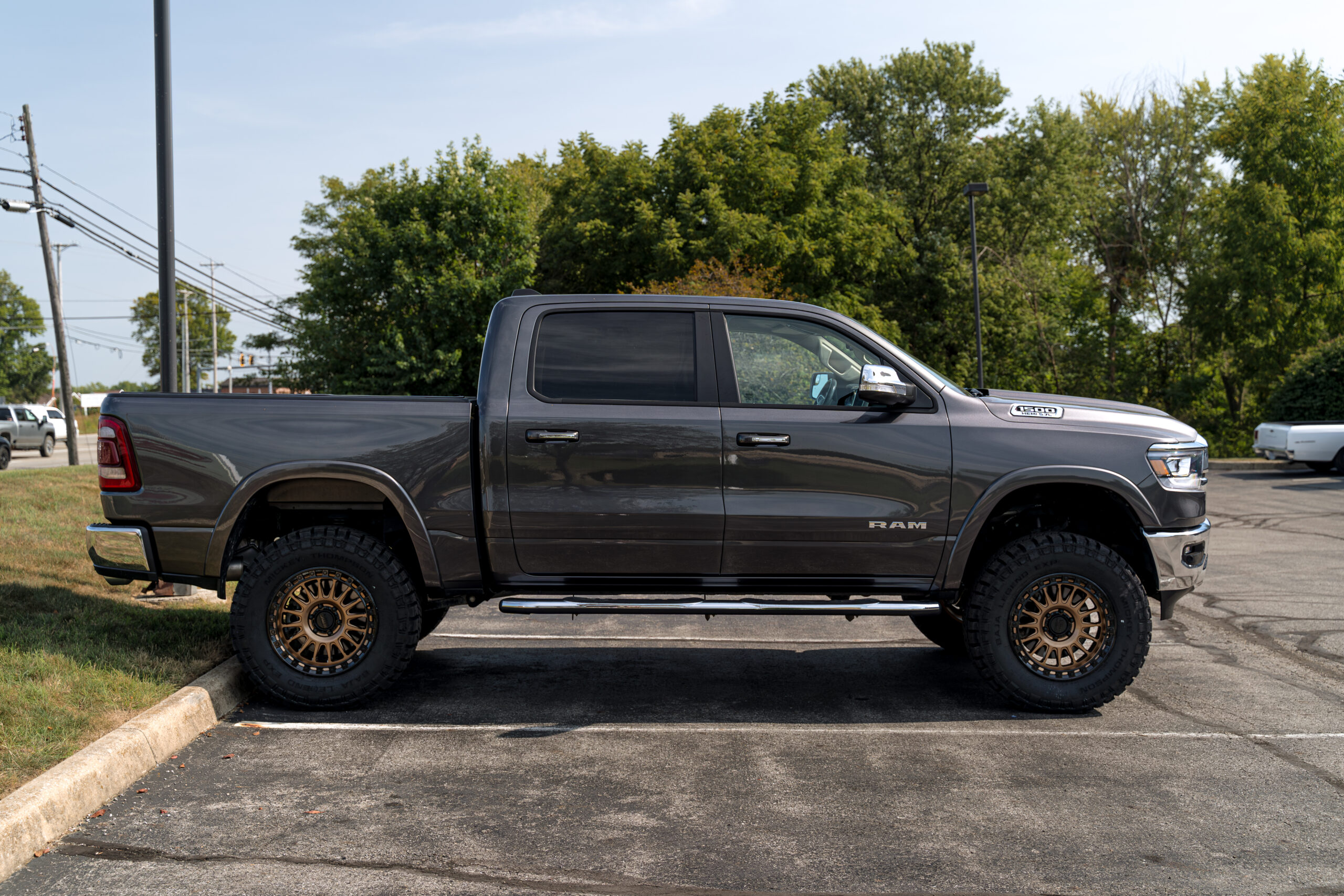 5th Gen ram with Readylift lift kit, KMC Wheels, and Mickey Thompson tires