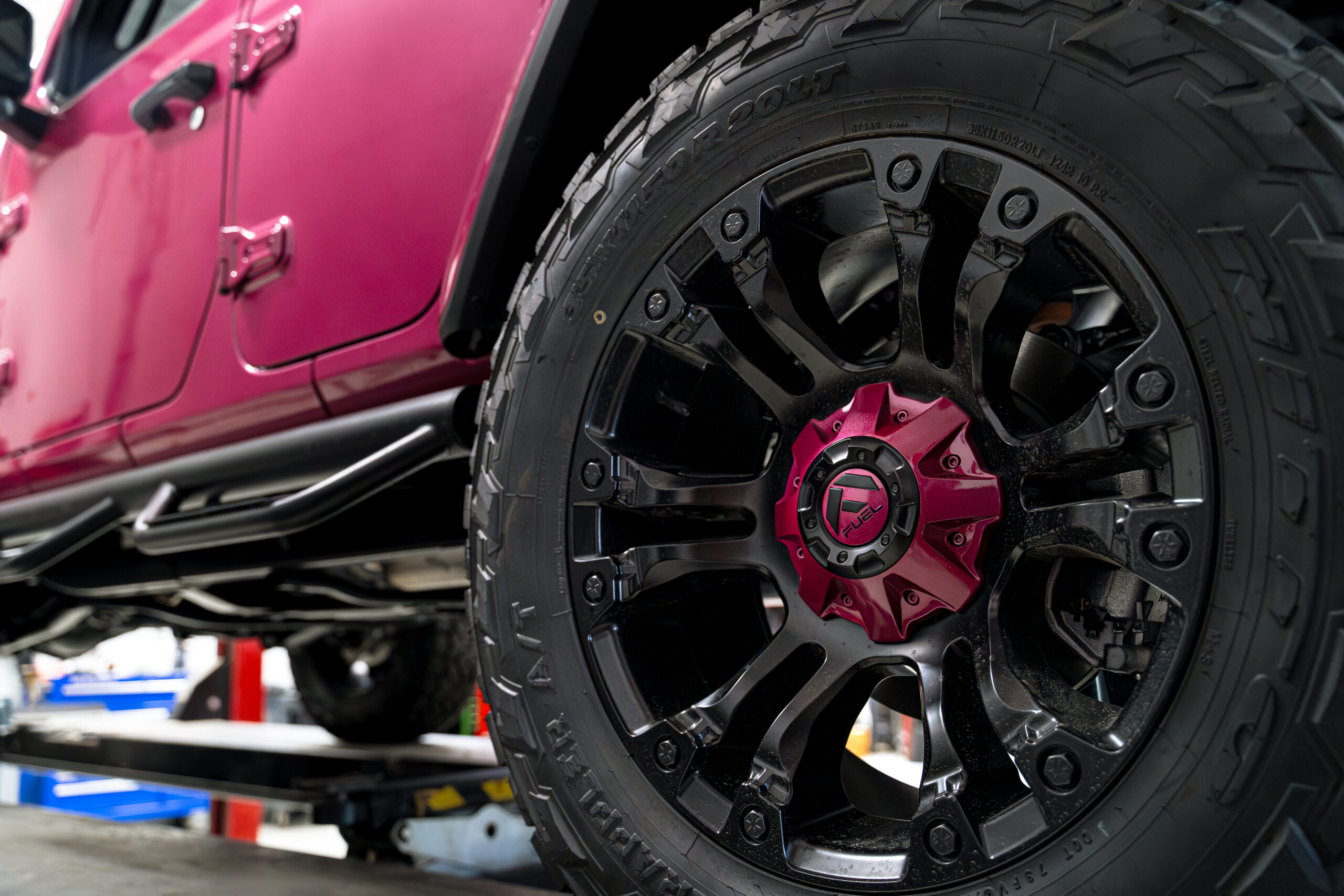 Fuel wheels with custom pink center caps on Jeep Wrangler