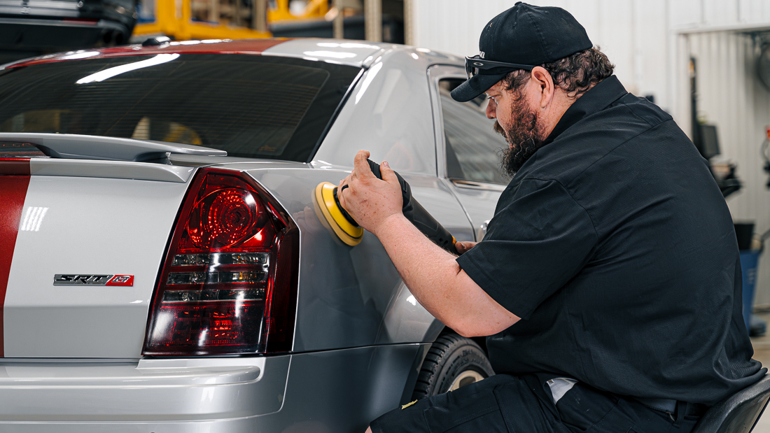 PickupsPlusCars detailer paint correcting a Chrysler 300 SRT8